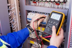engineer in electrical cabinet